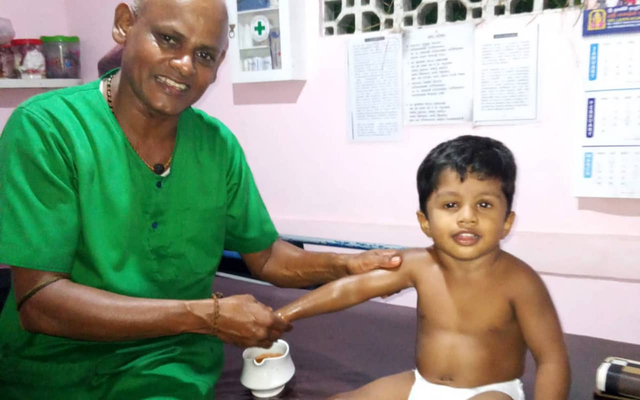 Dr.Shiva treating a kid